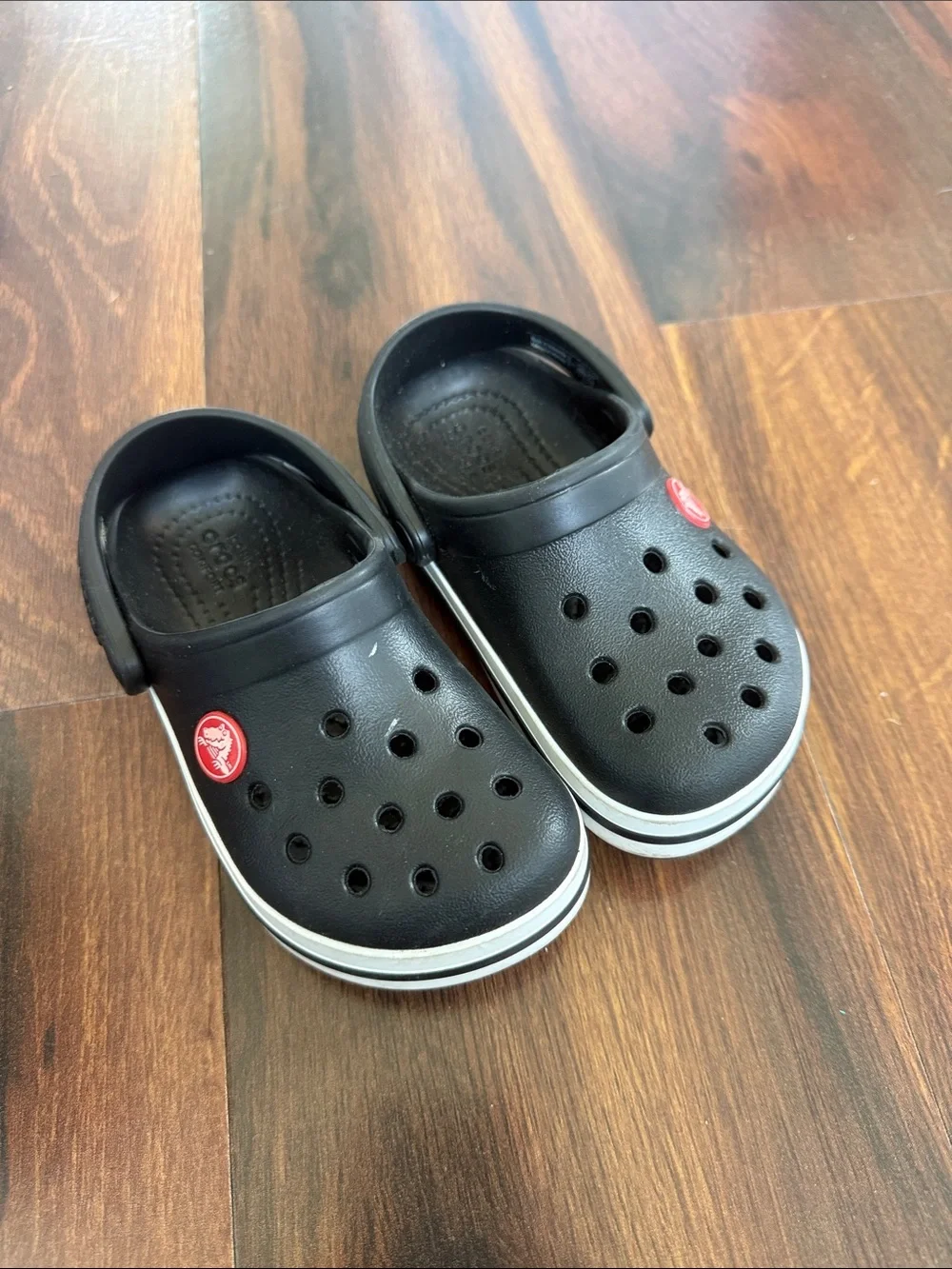 CROCS Kids Black Clog with White Trim and Red Logo